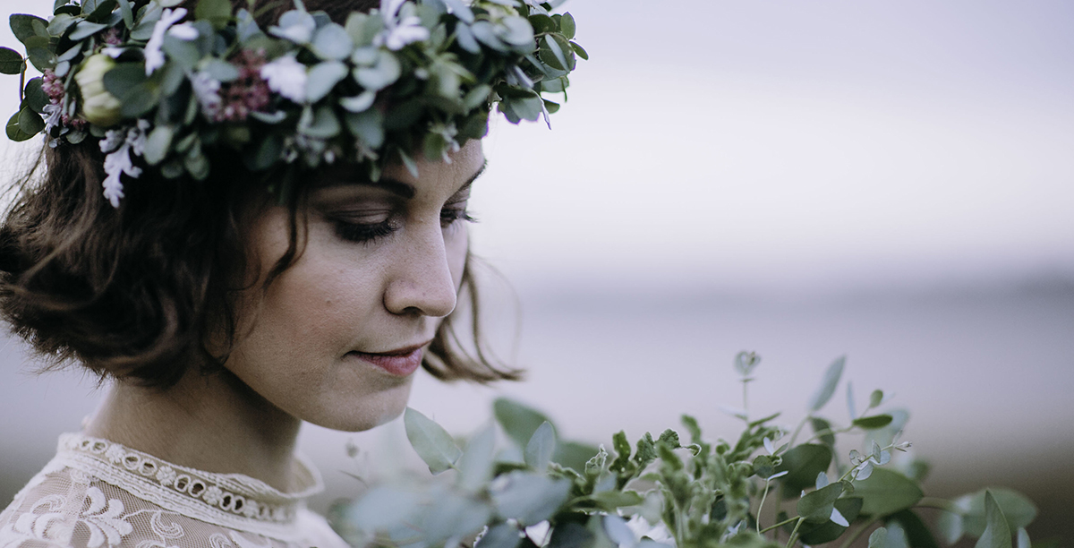 image of woman with floral crown